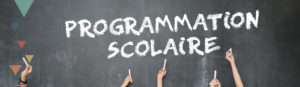 tableau noir avec écrit dessus : programmation scolaire